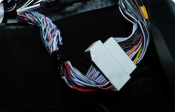 Beat-Sonic Encore Sigma plug and play harness with its factory style connector, shown in the vehicle